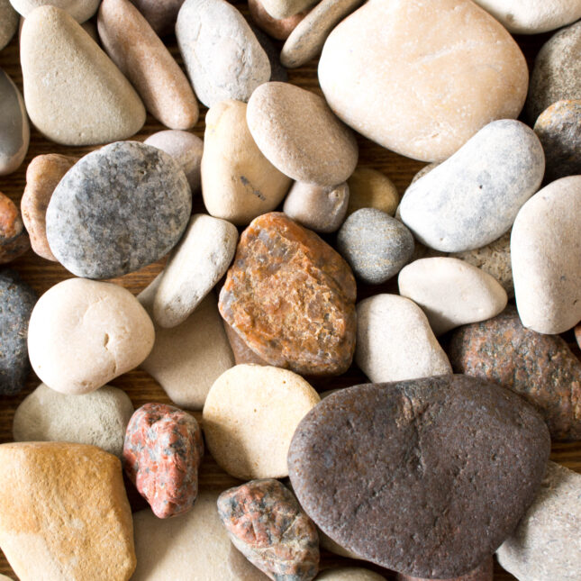 Photograph of colorful pebbles/rocks on a table