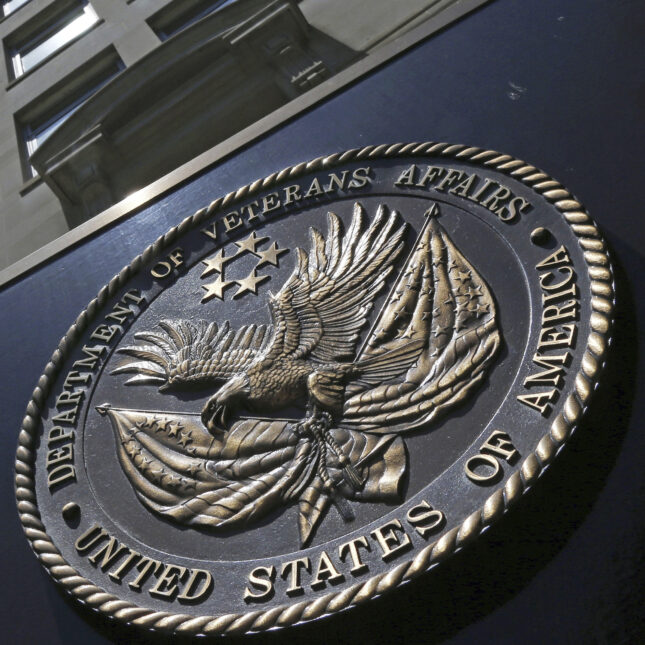 A seal is displayed on the front of the Veterans Affairs Department building in Washington