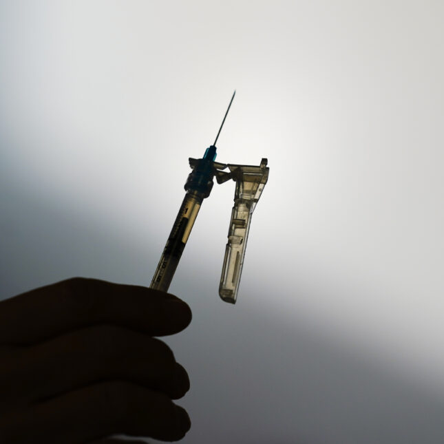 A syringe is prepared at a clinic in Norristown, Pa., Dec. 7, 2021. The Environmental Protection Agency finalized a rule Thursday, March 14, 2024, imposing stricter limits on a chemical used to sterilize medical equipment after finding a higher-than-expected cancer risk at facilities that use ethylene oxide to clean billions of devices including catheters and syringes. (