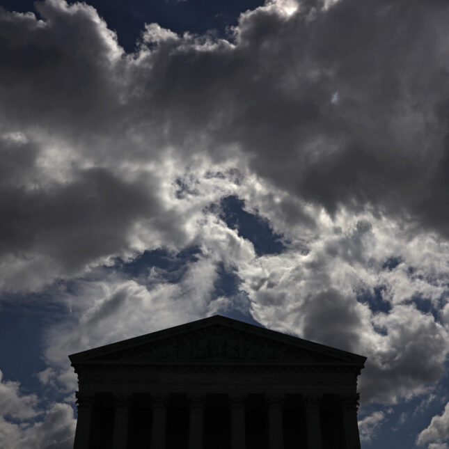 Clouds hang above the U.S. Supreme Court building. -- health policy coverage from STAT