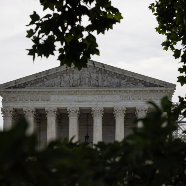 The Supreme Court surrounded by trees. -- health policy coverage from STAT