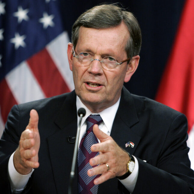 Then U.S. Health and Human Services Secretary Michael O. Leavitt speaks during a news conference in the heavily fortified Green Zone area October 20, 2008 in Baghdad, Iraq.