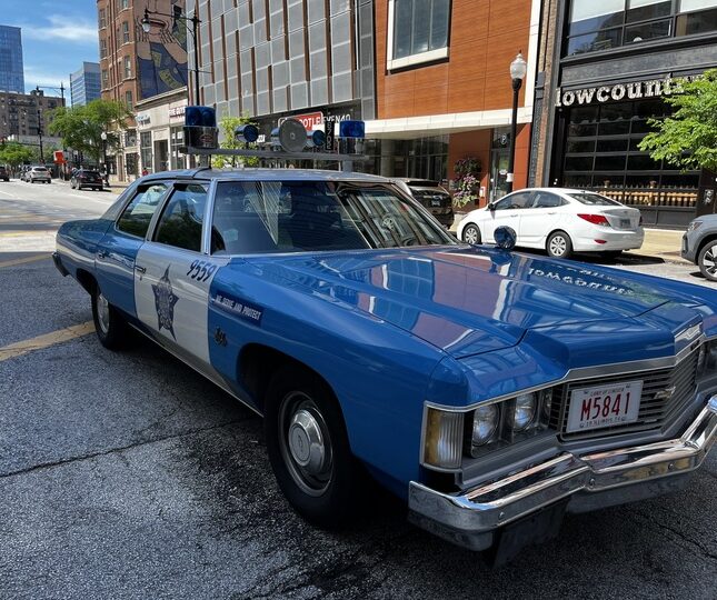 vintage police car near site of ASCO